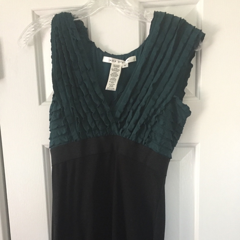 Forest green and black dress - form fitting.